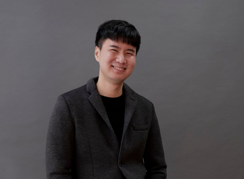 Portrait of Young Business Man in Business Suit